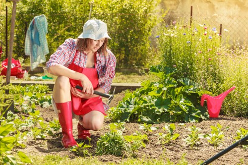 Gardener discussing a free, no-obligation quote with a resident